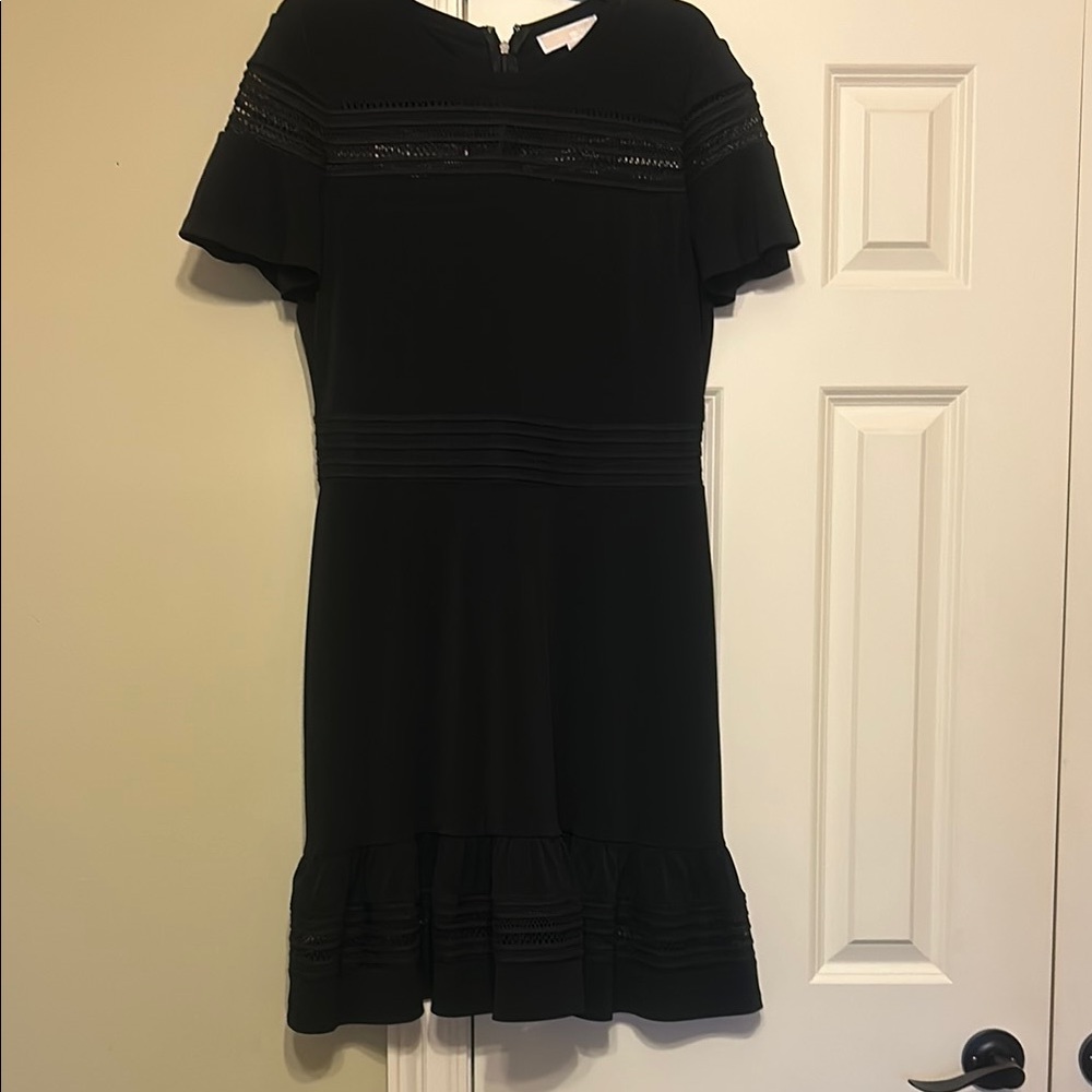 Michael Kors Elegant Black Dress with a Flutter Hem